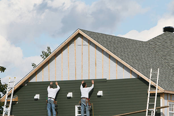 Professional Siding technician working in Cranesville, PA